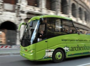 4874815-Archeobus_passing_the_Colosseum_Rome